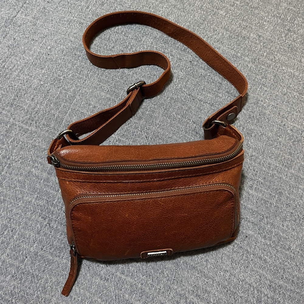 Genuine leather spikes & sparrow belt bag